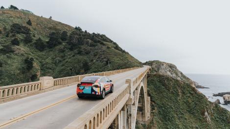 Car driving on Bixby Bridge in Big Sur, California Car driving on Bixby Bridge in Big Sur, California