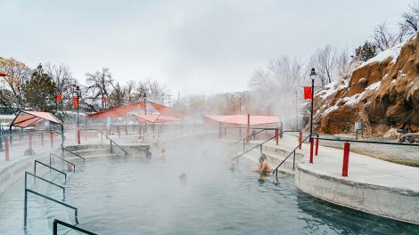 Enjoying a soothing dip in an outdoor hot pool in Lava Hot Springs, Idaho