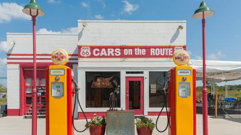 Cars on the Route historic service station on Route 66 in Galena, Kansas