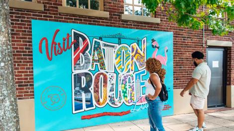 Admiring a mural in Baton Rouge, Louisiana