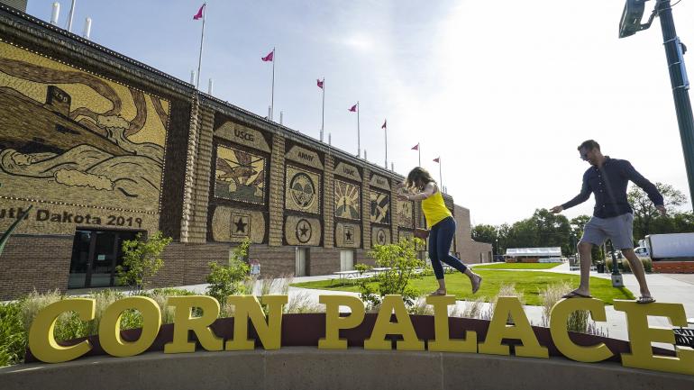 Posing outside the Corn Palace in Mitchell, South Dakota