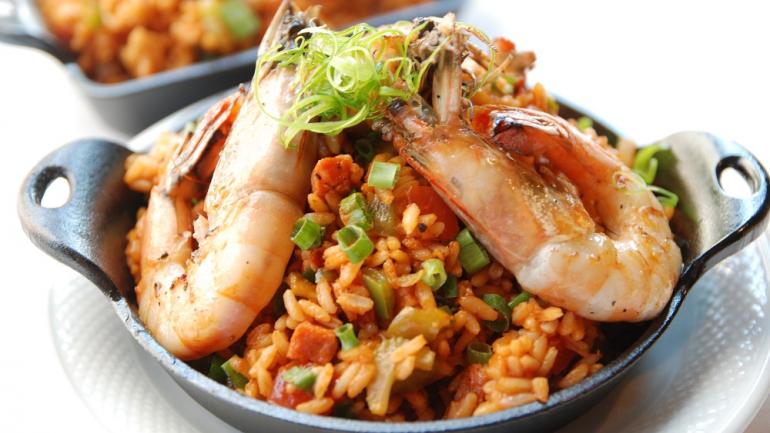 Jambalaya is a one-dish meal that changes with the seasons. Yours might include shrimp or alligator, though the dish is always blended with flavorful rice.