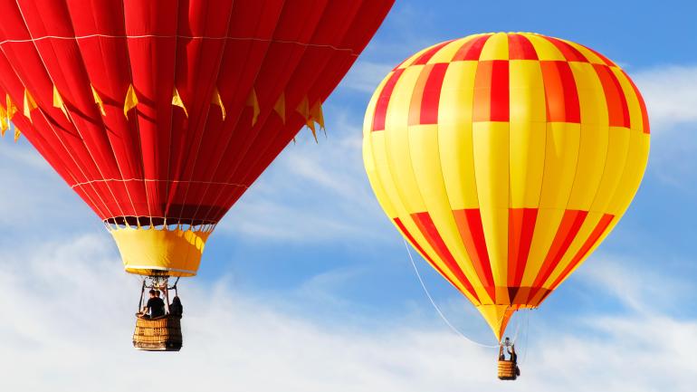 Roar of burners as balloons take off for the morning ascension