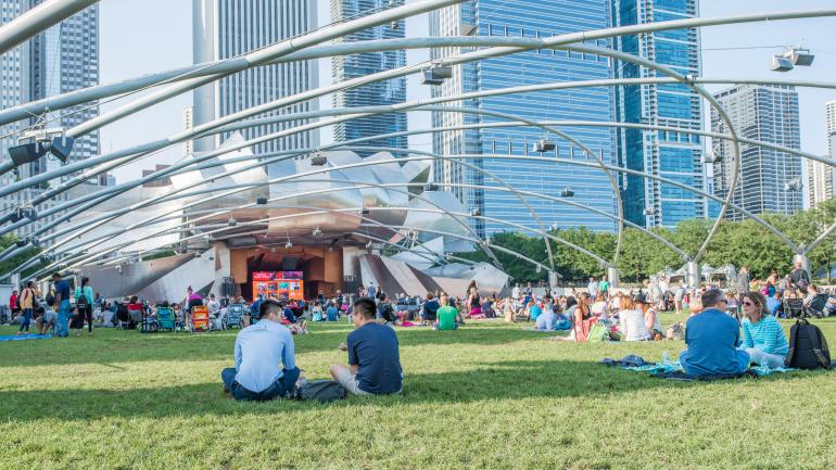 Taking in an outdoor concert at the Jay Pritzker Pavilion in Chicago's Millennium Park