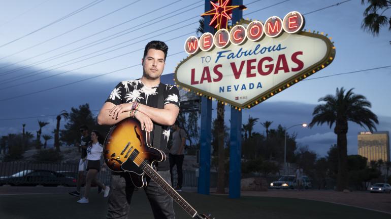 Moreno, posing with the famed Las Vegas sign 