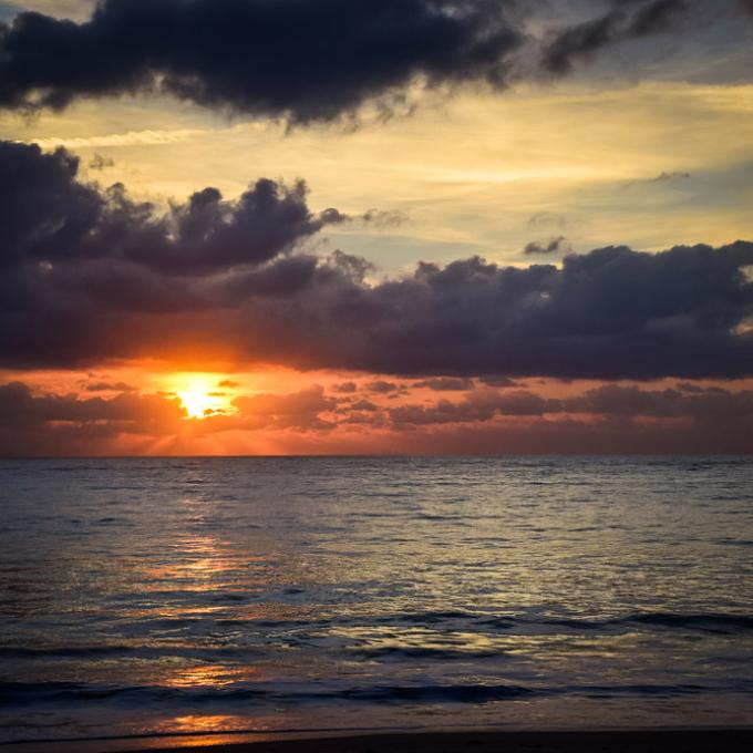 The sun setting on horizon at Vero Beach