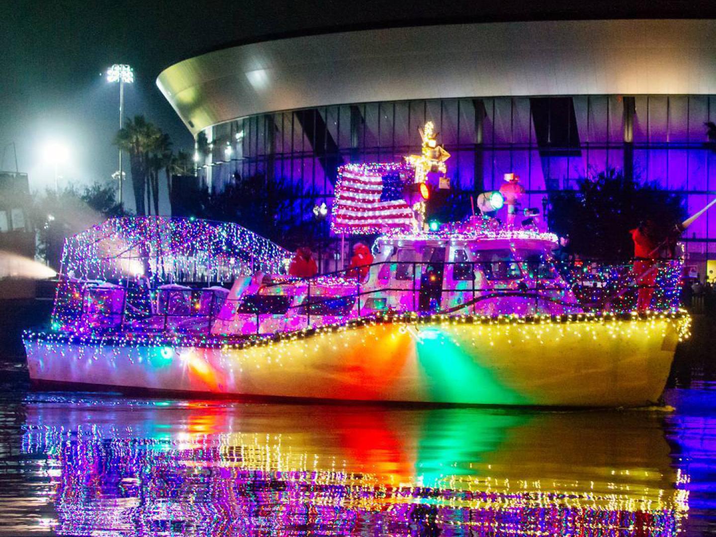 A colorful light display on a boat during the Stockton Lighted Boat Parade in California