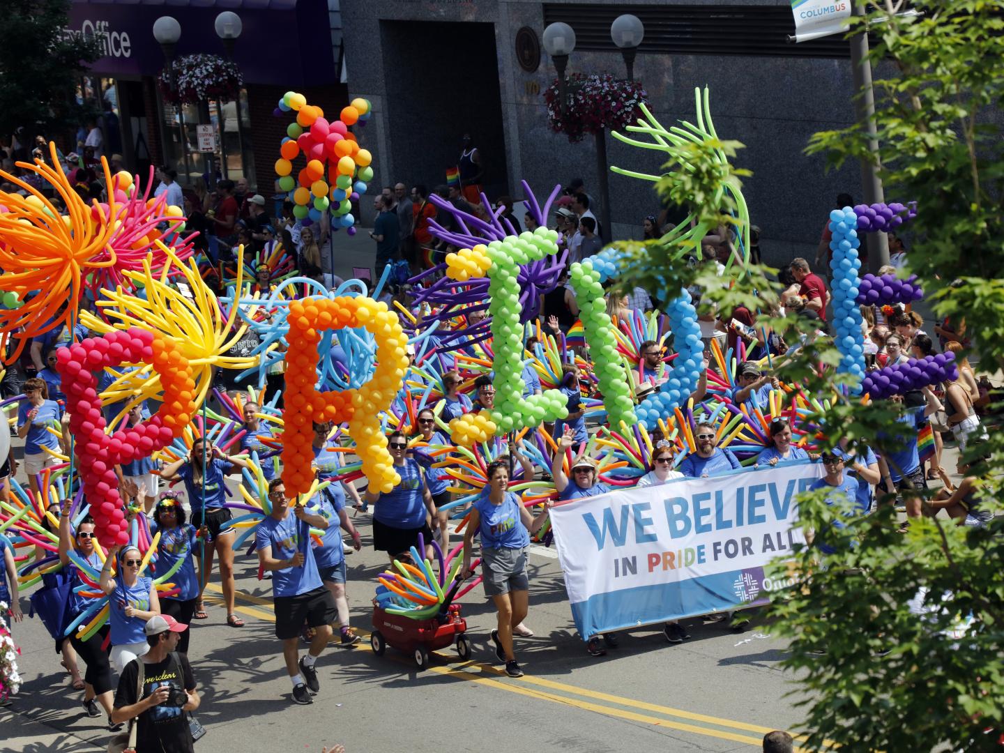 Parading down Scioto Mile during the Columbus Pride Festival