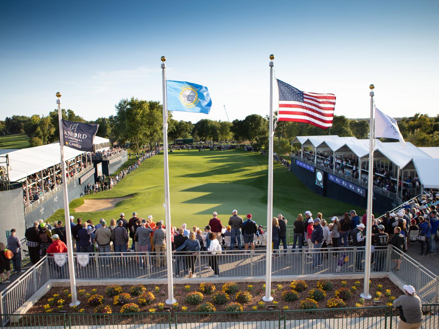 Spectators watching the Sanford International golf tournament at Minnehaha Country Club in Sioux Falls, South Dakota