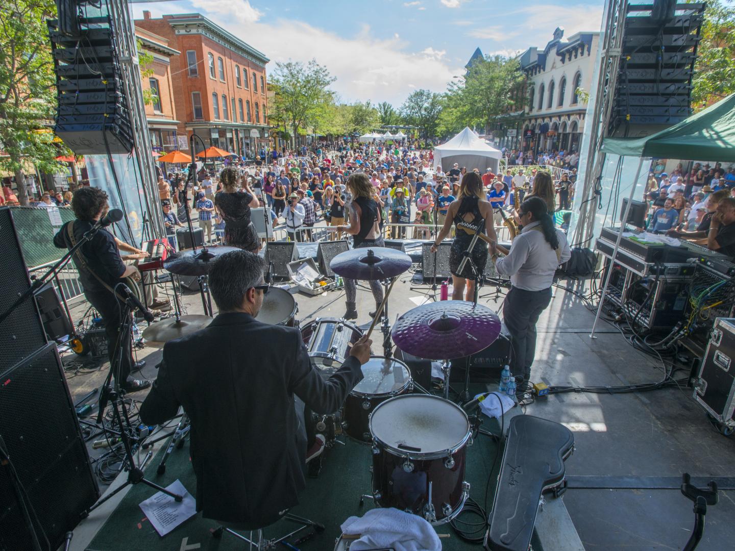 Live music in downtown Fort Collins, Colorado, during Bohemian Nights at NewWestFest