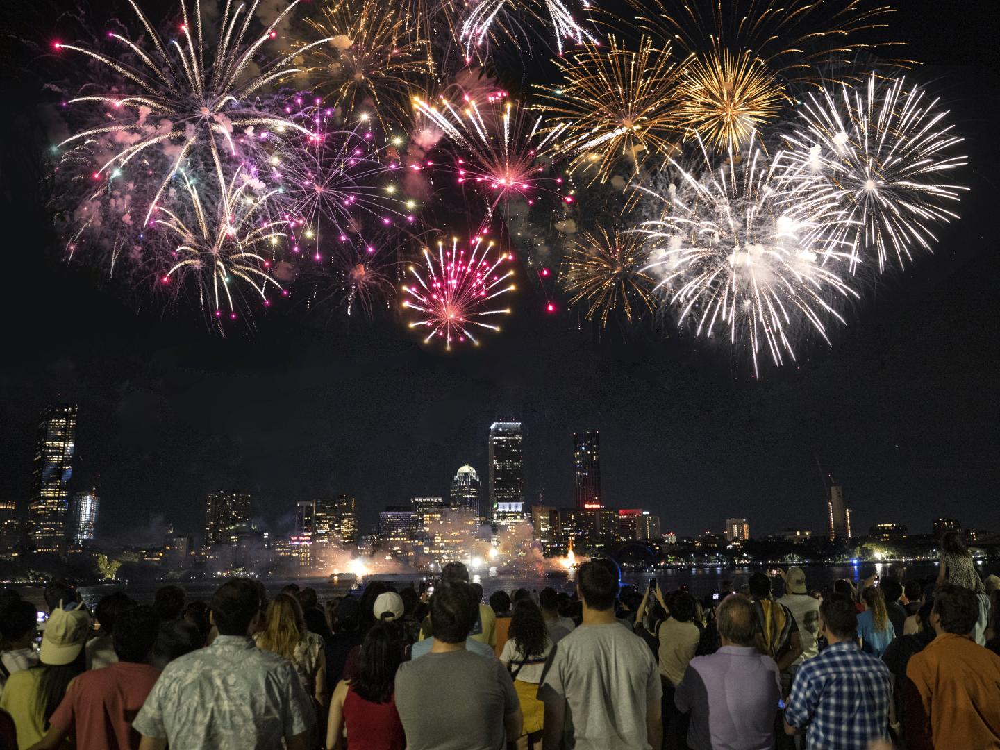 Fireworks over Boston Harbor during the annual Harborfest in Boston, Massachusetts