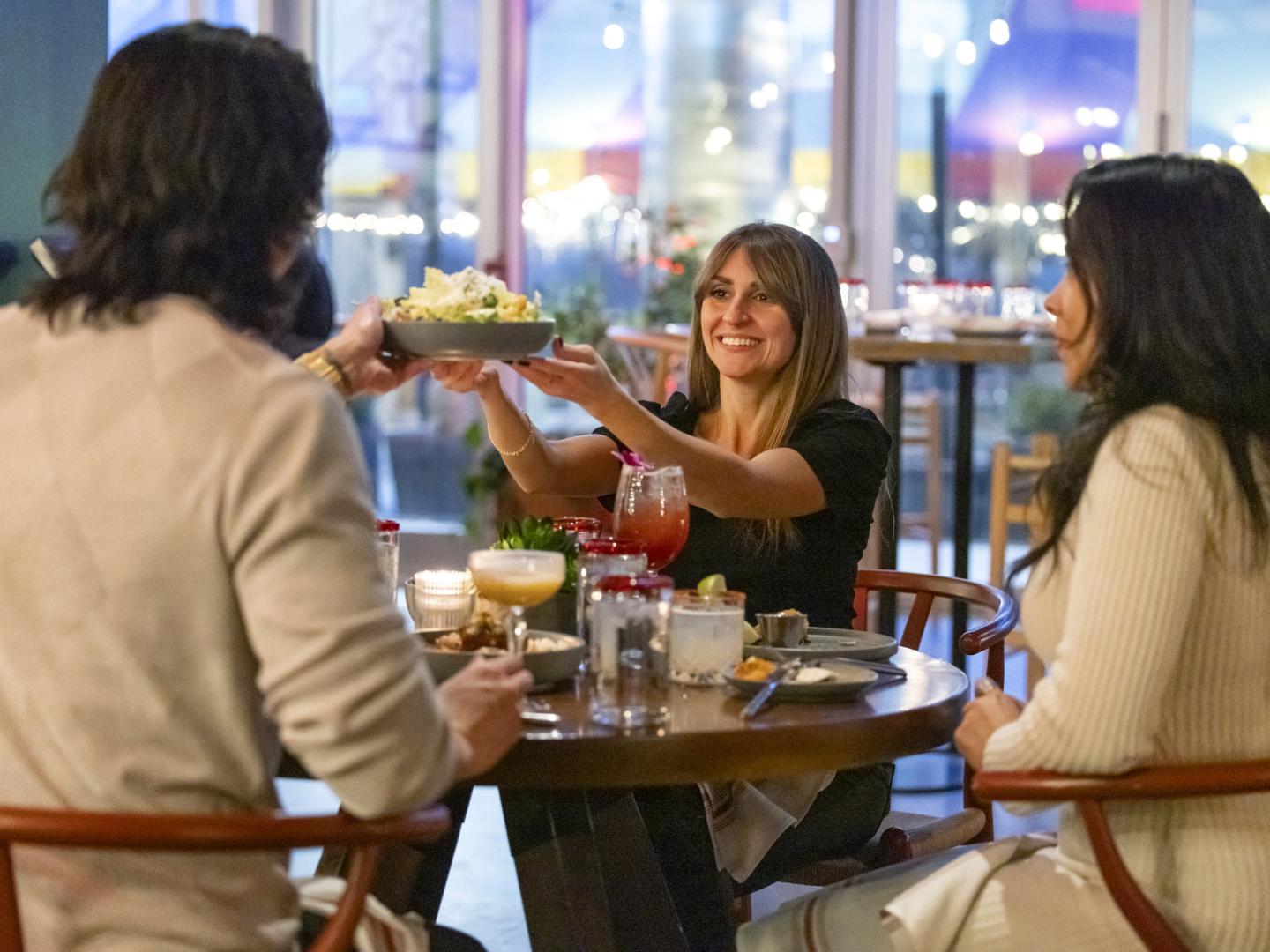 Guests enjoying dishes from Para Maria in Boston, Massachusetts