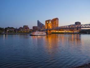 A riverboat cruise on the Ohio River with the Covington skyline beyond A riverboat cruise on the Ohio River with the Covington skyline beyond