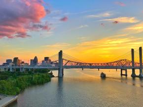 Sunset over the Ohio River, which flows alongside downtown