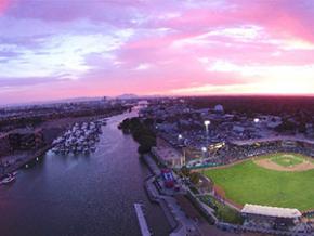 A colorful sunset over the Banner Island Ballpark A colorful sunset over the Banner Island Ballpark