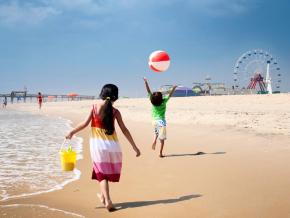 Kids playing along the shoreline Kids playing along the shoreline