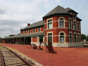 The striking red brick exterior of the restored Katy Depot, originally built in 1896