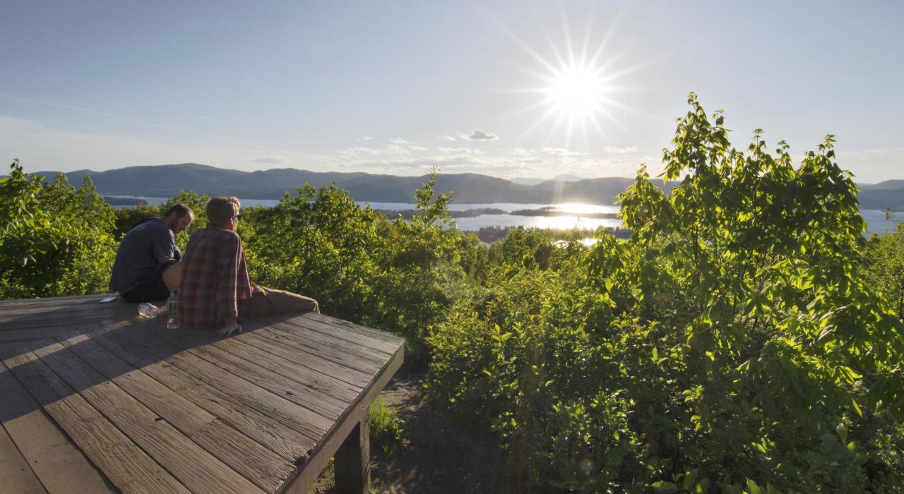 Watching the sunset over the lake from a scenic overlook
