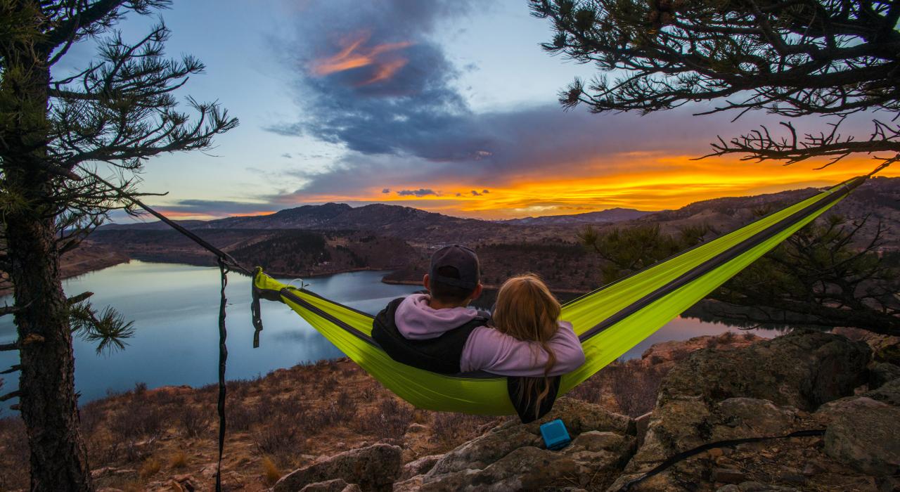 Watching a colorful sunset from a hammock overlooking Horsetooth Reservoir