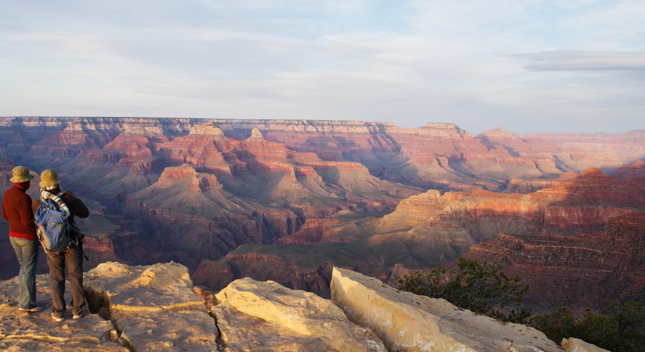 Hikers take in sweeping views of the Grand Canyon