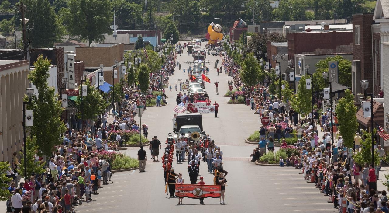 Lining the street to watch a parade