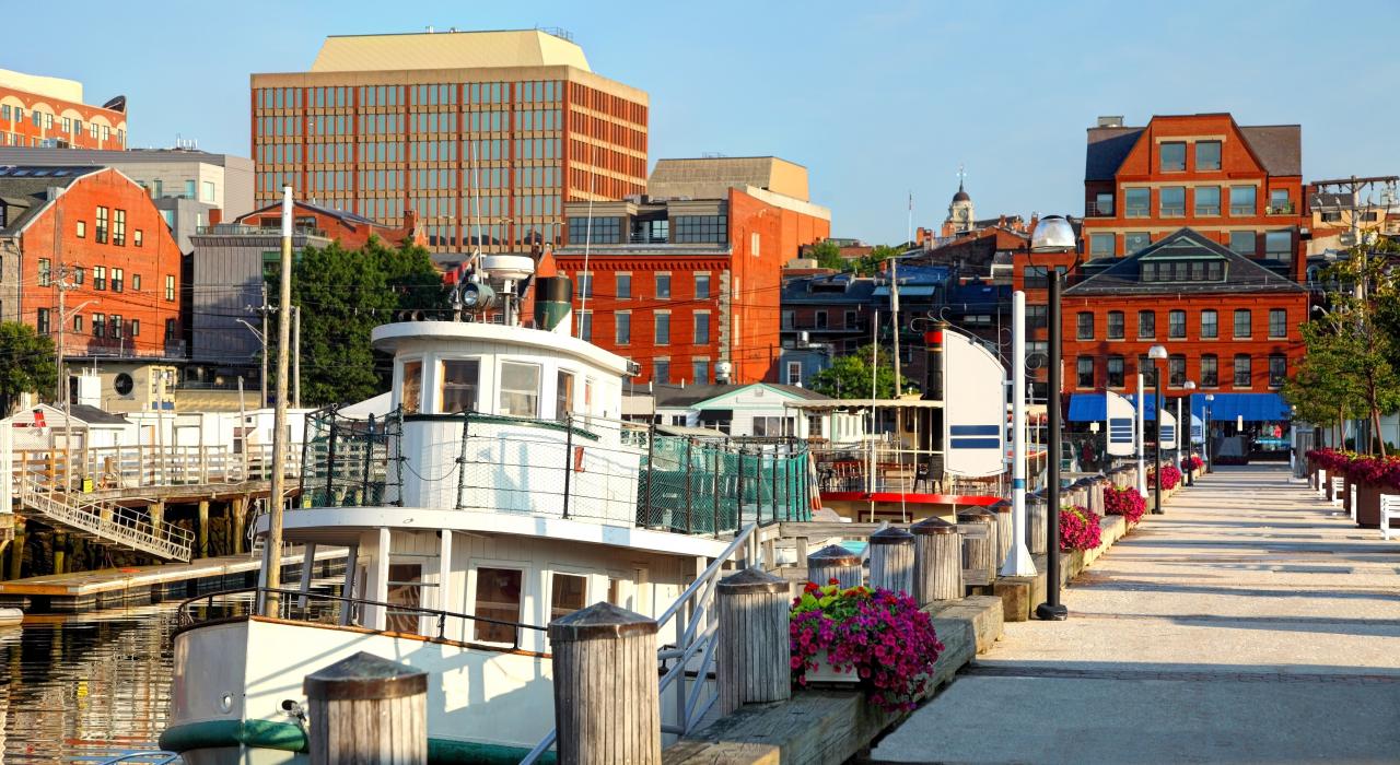 Tugboat joins other vessels docked in the scenic Portland Harbor