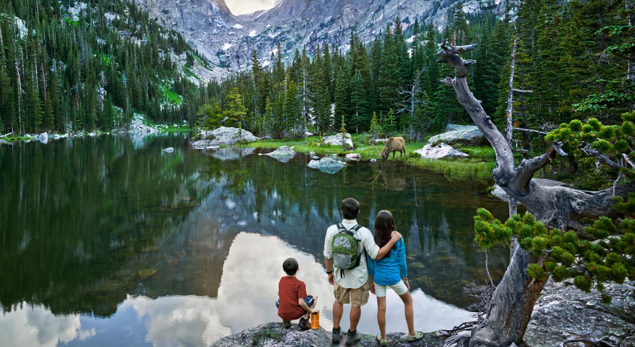 Stopping to admire the mountain scenery while hiking 