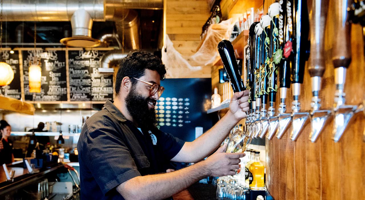 Pouring an artisan ale at the Jolly Pumpkin Detroit Pizzeria & Brewery 