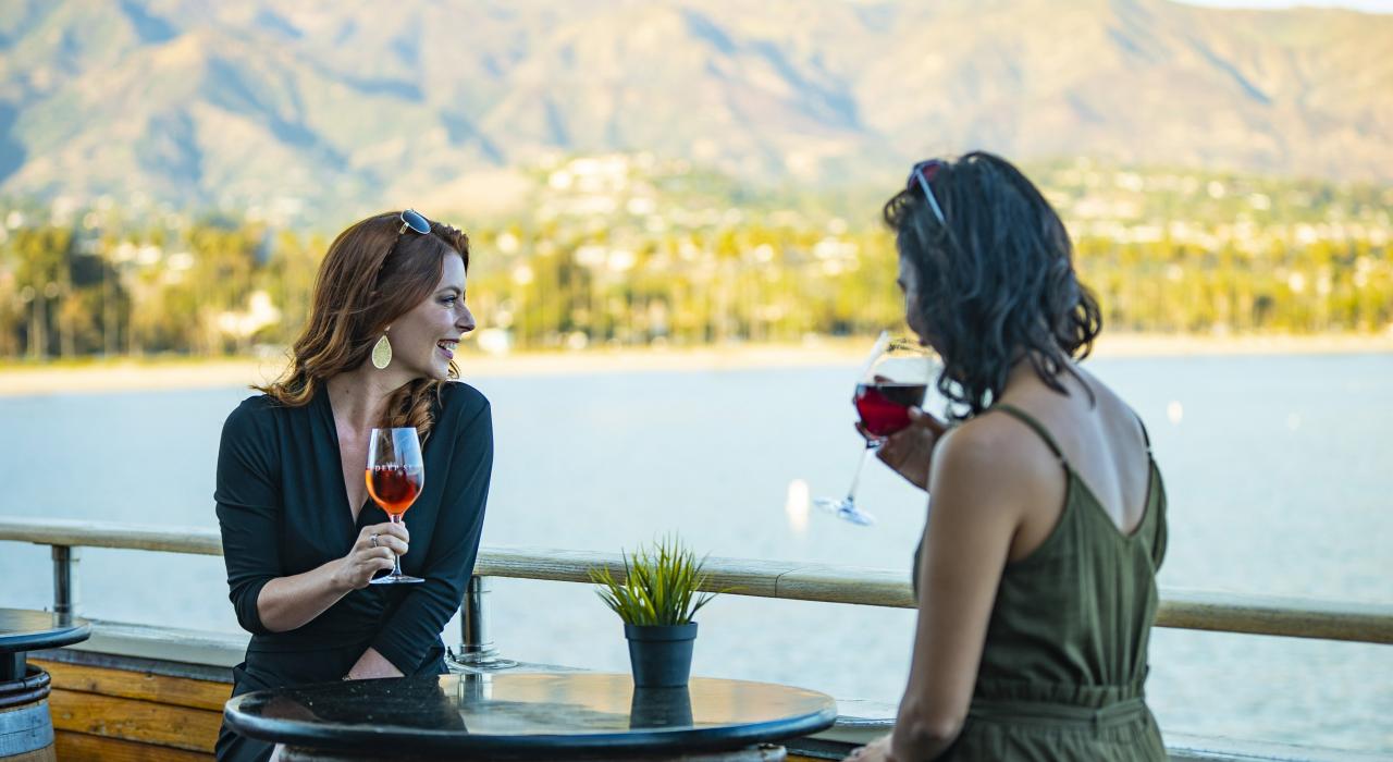Sipping wine at the Deep Sea Tasting Room on Stearns Wharf in Santa Barbara, California Sipping wine at the Deep Sea Tasting Room on Stearns Wharf in Santa Barbara, California
