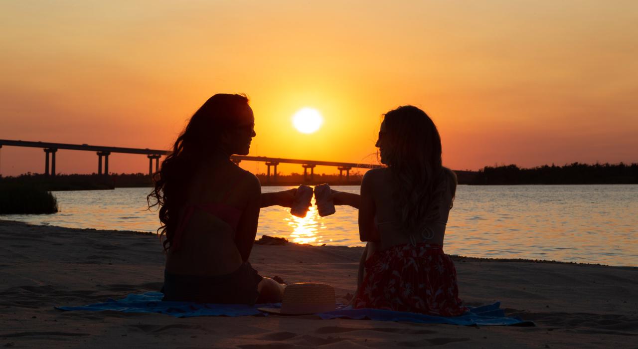 Watching sunset from the beach at Golden Nugget Lake Charles Hotel & Casino in Louisiana