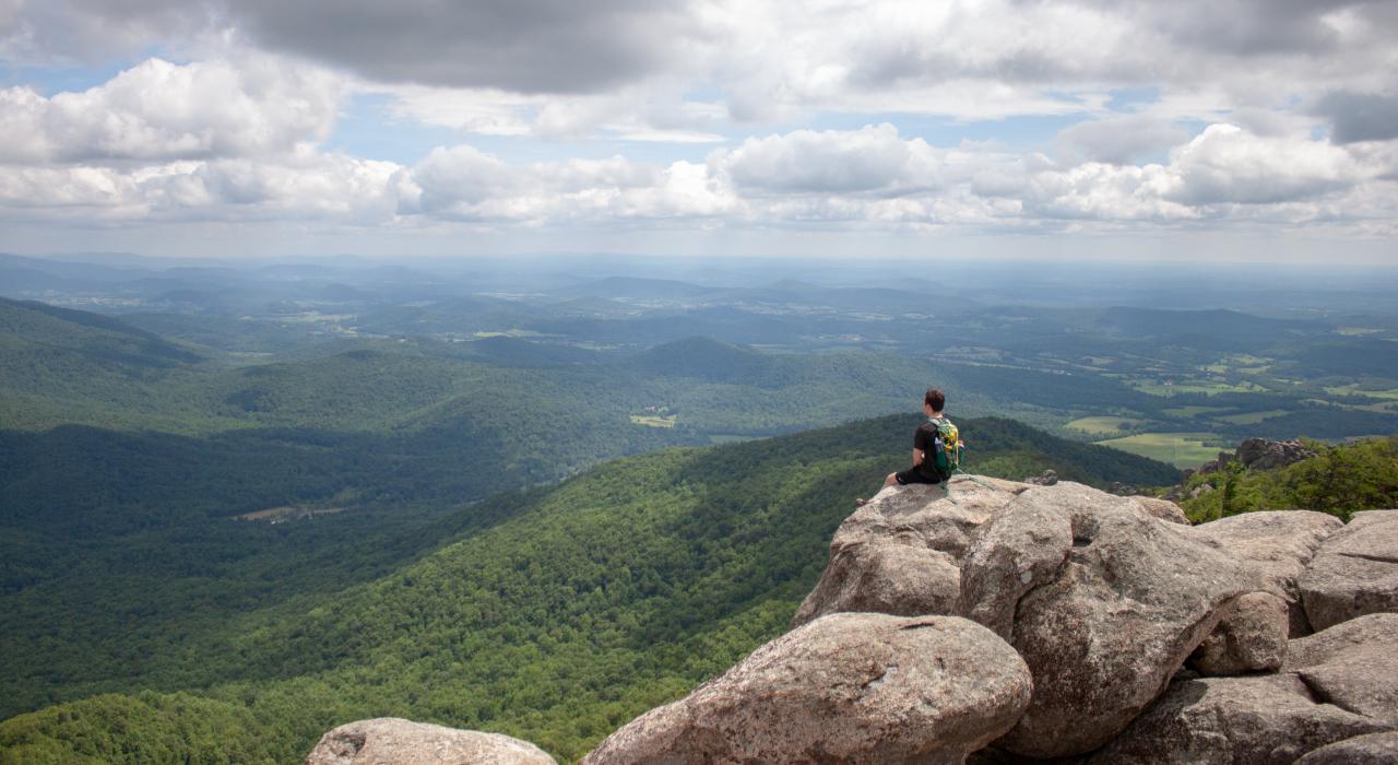Gazing out from the summit of Old Rag Mountain in Shenandoah National Park, Virginia
