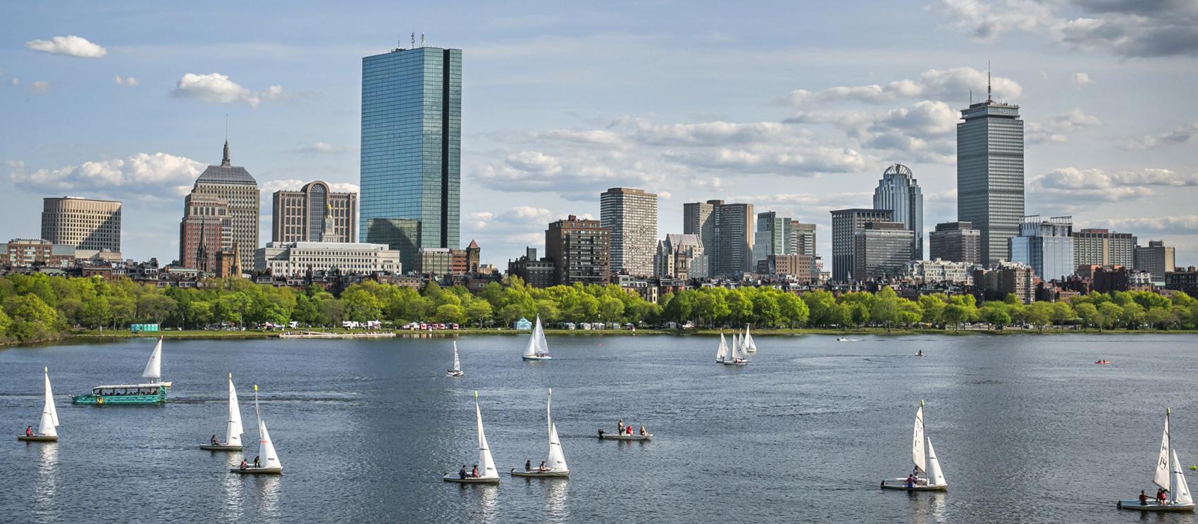 Boats on the Charles River with the Boston skyline in the background